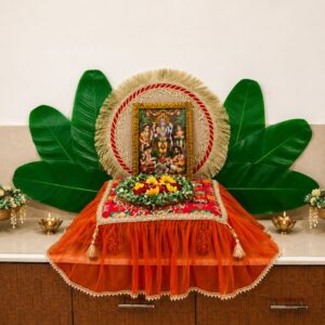 handcrafted festive pooja chowki decor set with banana leaf backdrop